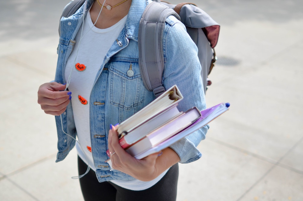 Girl carrying books