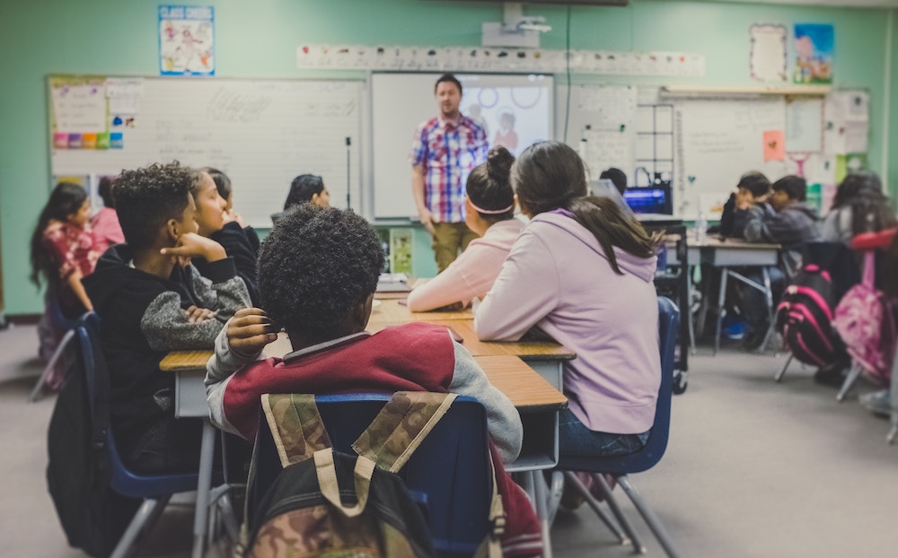 A photo of a diverse classroom of students